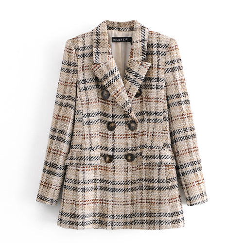 Plaid patterned coat on a white background