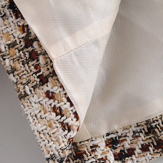 Close-up of textured fabric with a patterned border