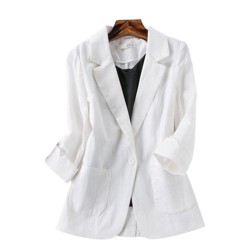 White blazer on a wooden hanger against a white background